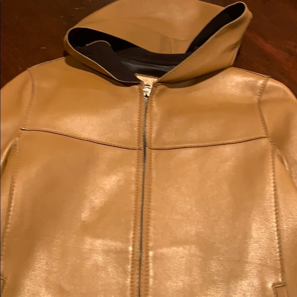 Super cute genuine leather jacket with hoodie.